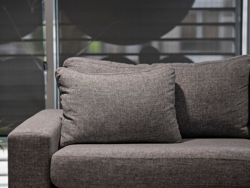 Cleaning fabric sofa with specialized tools